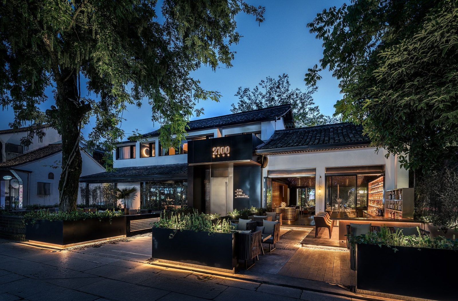 Commercial landscape lighting at a Knightdale business at dusk
