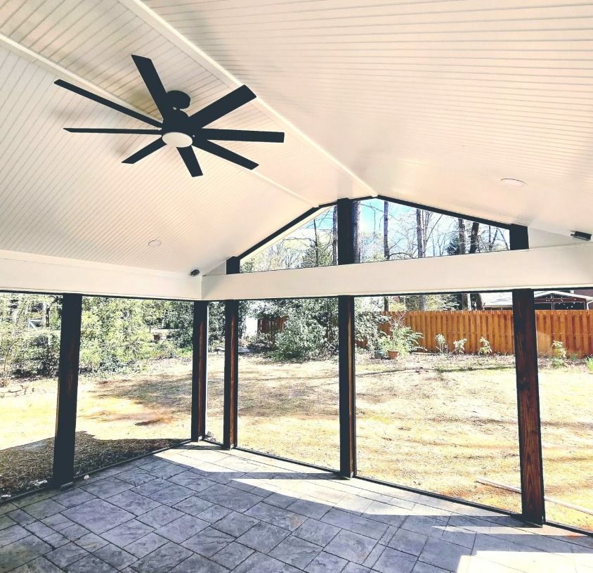 Covered patio with ceiling fan and lighting installed by Harris Electrical Contractors